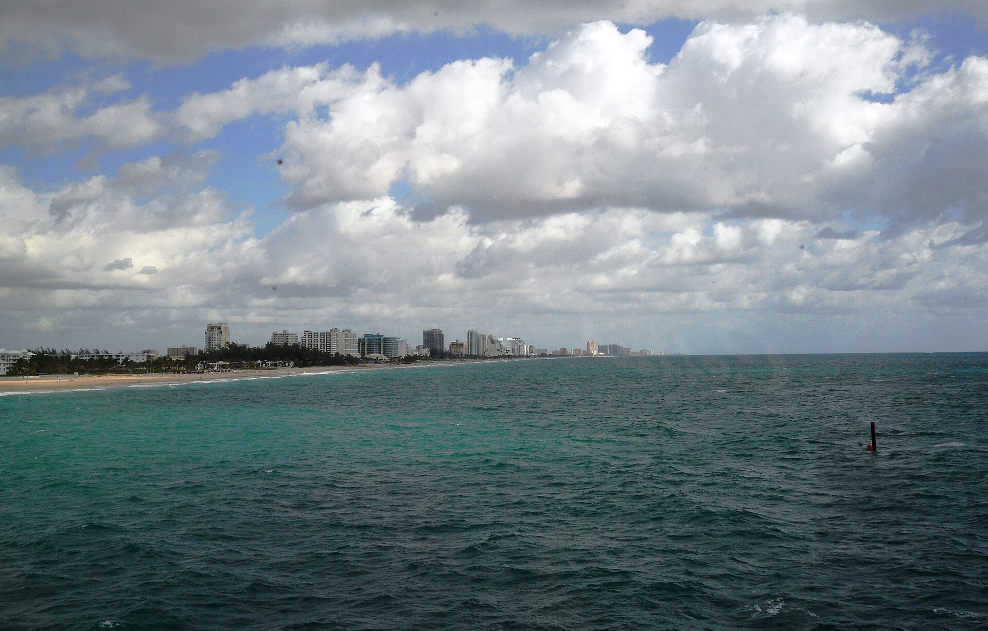 Golden sand and blue Atlantic water at Fort Lauderdale Beach.