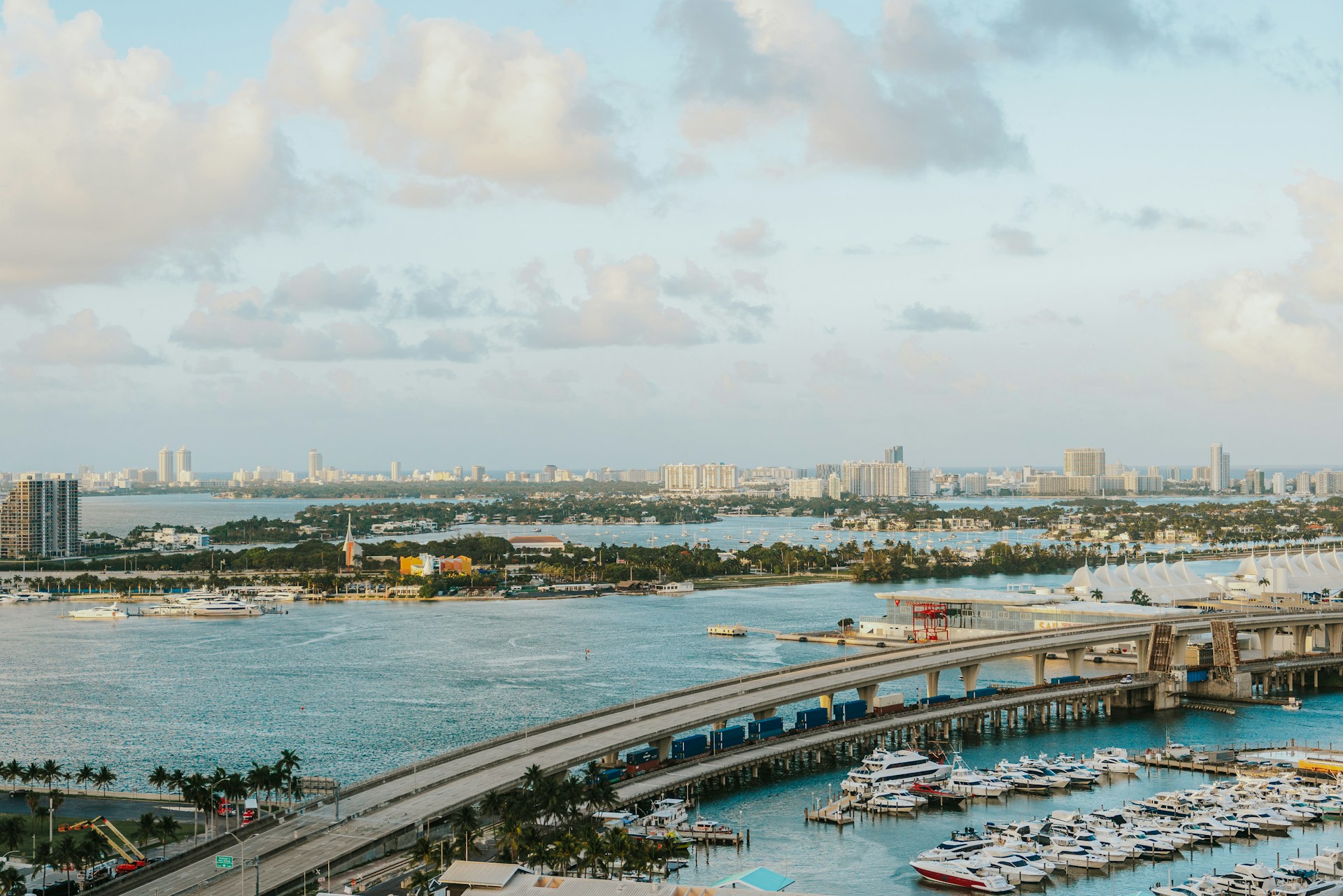Aerial view of Miami’s waterfront, marina and bridge.